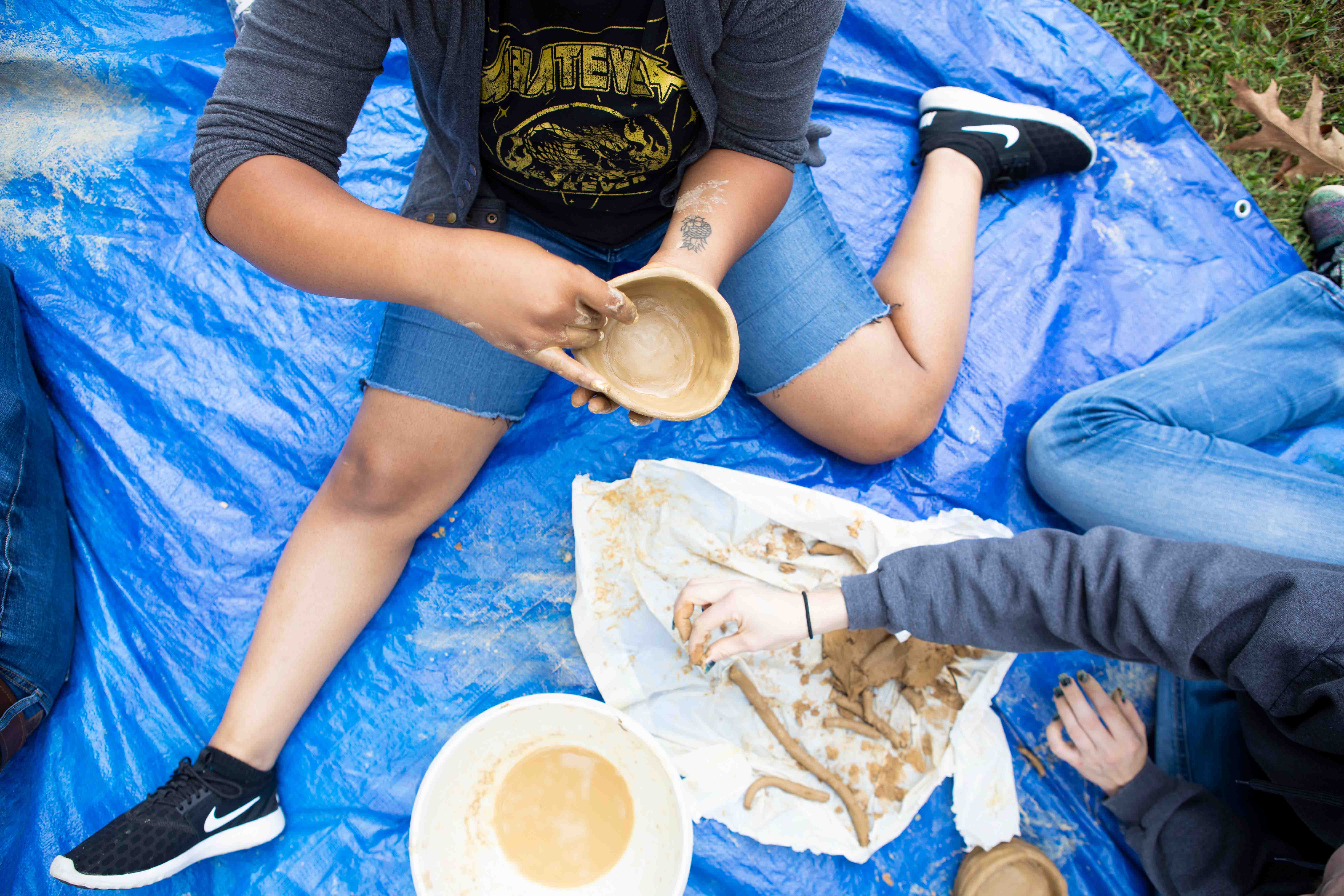 Students making pottery from scratch