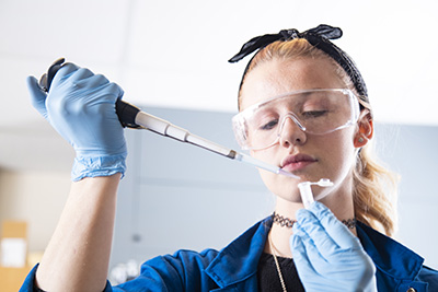 student in chemistry lab