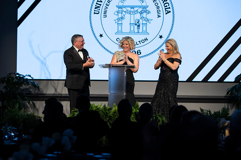Gary Kinard, Allyson Bretch ’14 and Christa Pitts ’97