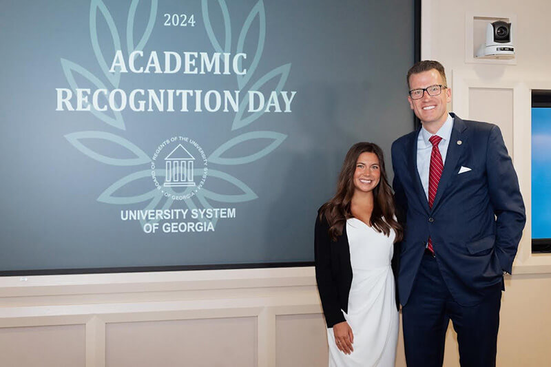 Malia Pope with Dr. Brendan Kelly, 沙巴官网 president