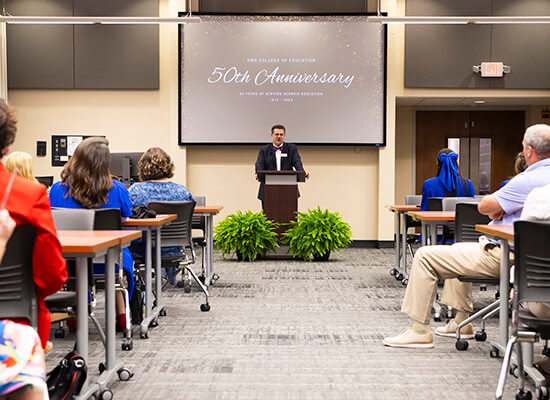 Dr. Mike Dishman, dean, spoke during the College of Education's 50th anniversary celebration