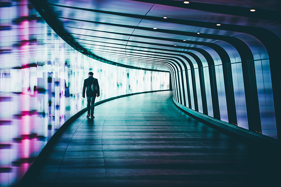 pathway in tunnel with person walking