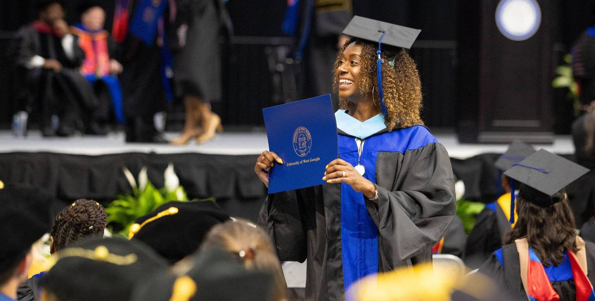 graduates at commencement